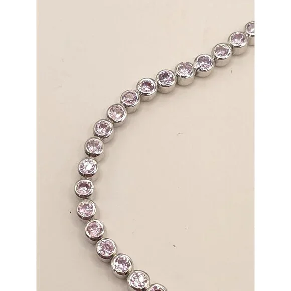 Silver Tone Tennis Bracelet With Pink CZ Stones & Secure Clasp - Picture 3 of 11